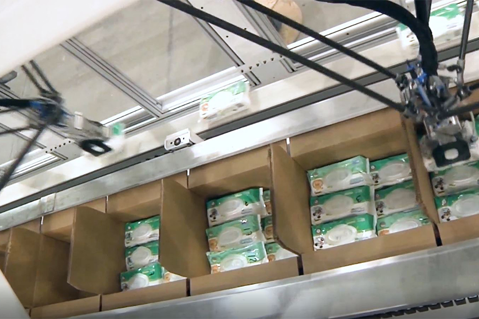 packing - packer - case packer - case packing - axium - axium solutions - numove - axium robotics