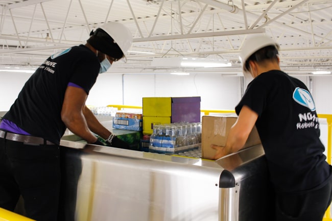 warehouse ipak palletizer - ipak palletizing - ipak - ipack - ipak palletizer - semi-automatic palletizer - mixed case palletizing - mixed load palletizing - semi automatic palletizing - mixed palletizing - mixed palletizer - mixed sku palletizer - mixed sku palletizing - numove - axium - axium solutions