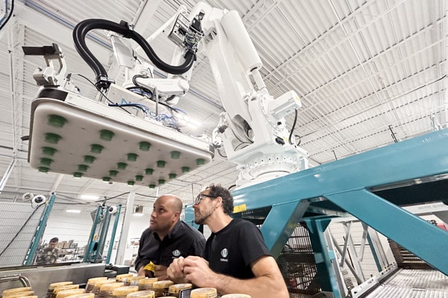 NūMove employees mechanically testing a robot