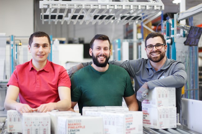 NūMove's employee smiling in the warehouse
