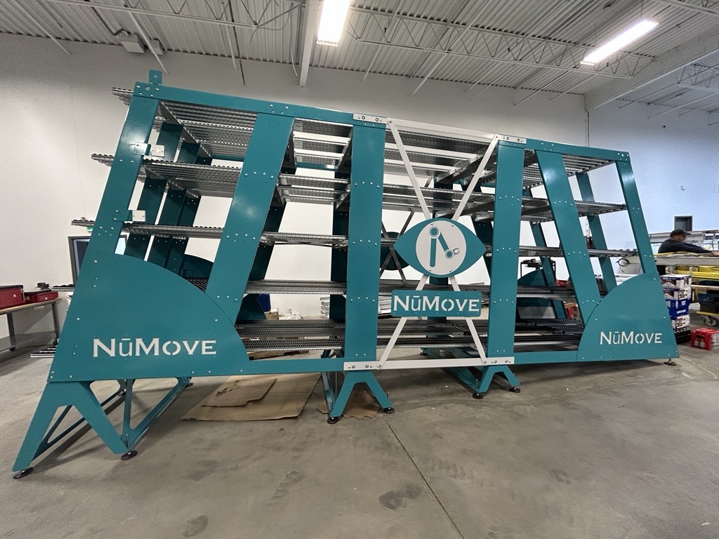 concept innovant d'équipement d'automatisation industrielle développé par NūMove en 2024 pour la préparation de commandes